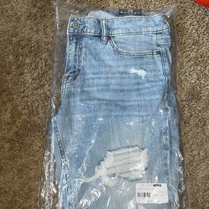 (Never worn) Famous girl mid rise jeans fashion nova